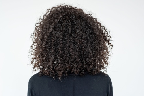Defined natural curls viewed from the back